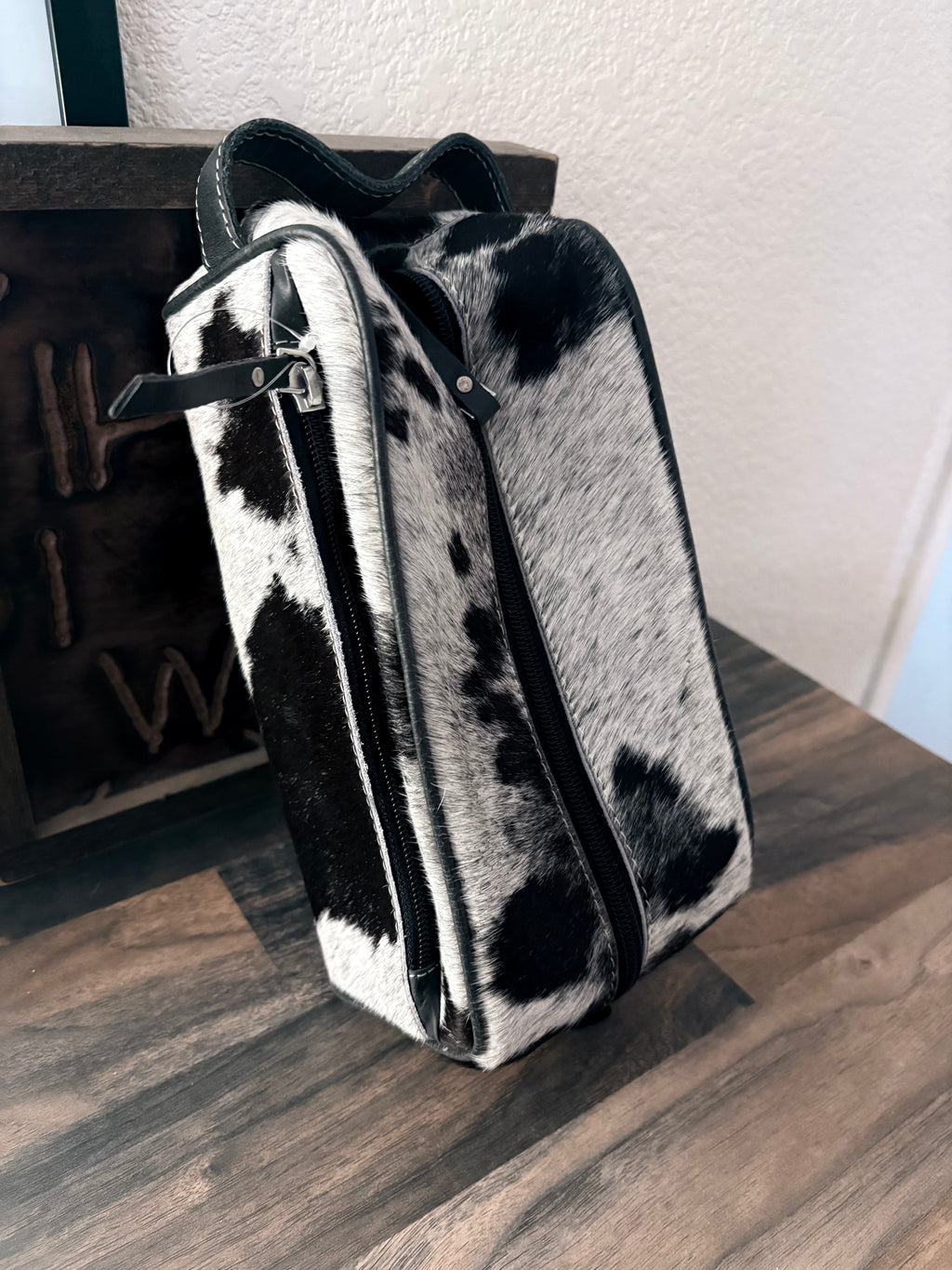 Toiletry bag black + white cowhide