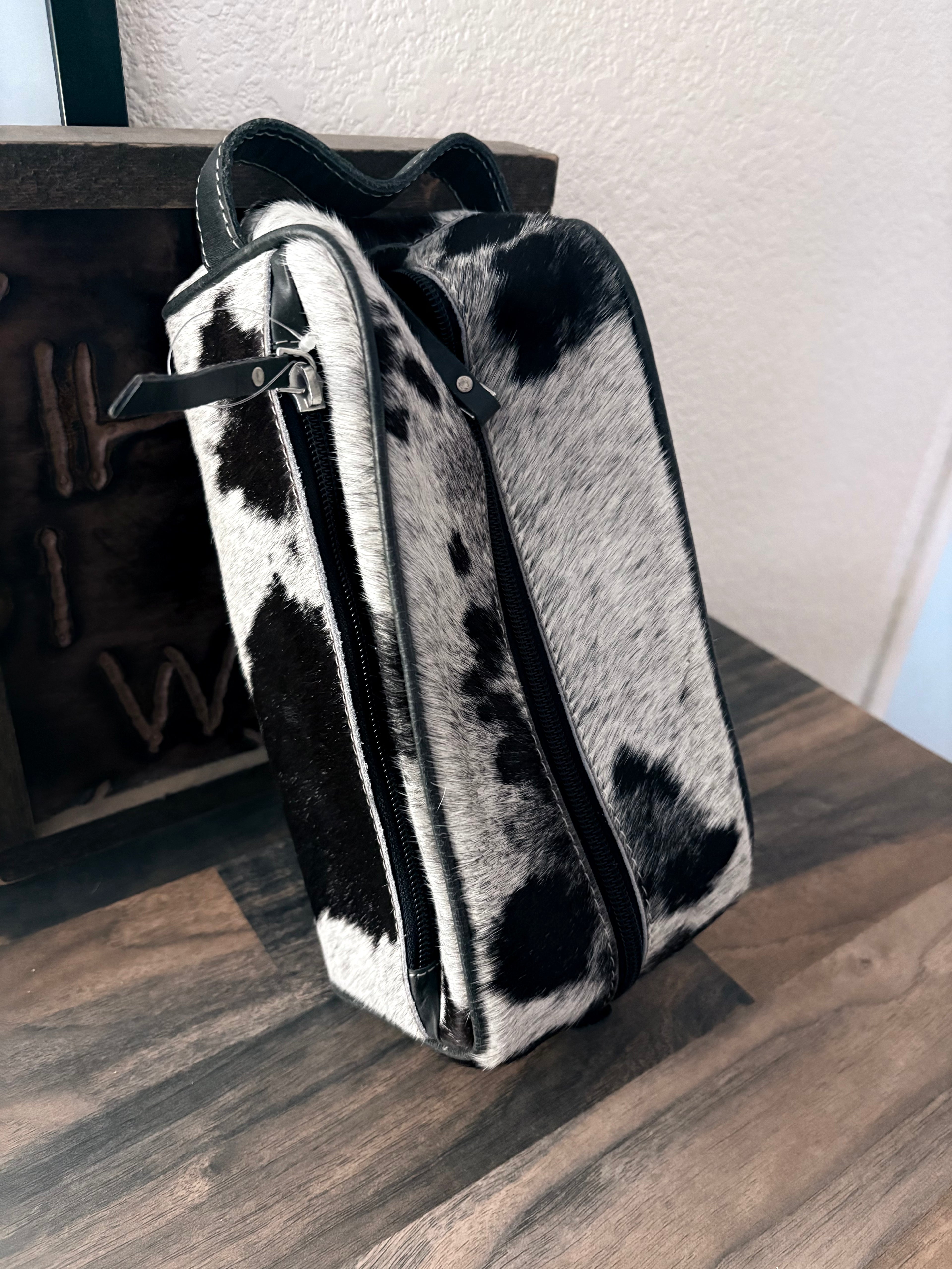 Toiletry bag black + white cowhide